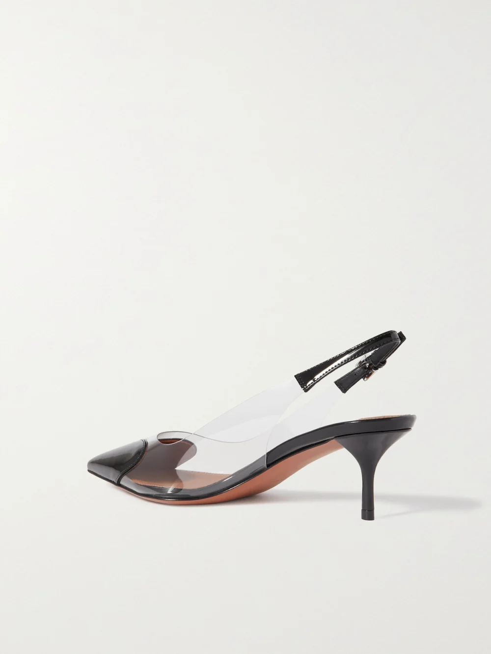Back view of the Alaïa Le Caur 55 Pu and Patent-leather Slingback Pumps