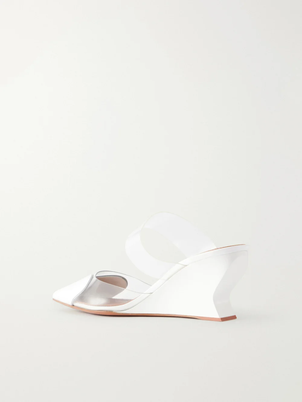 Back view of the Alaïa Le Caur 60 Patent-leather and Pvc Wedge Mules