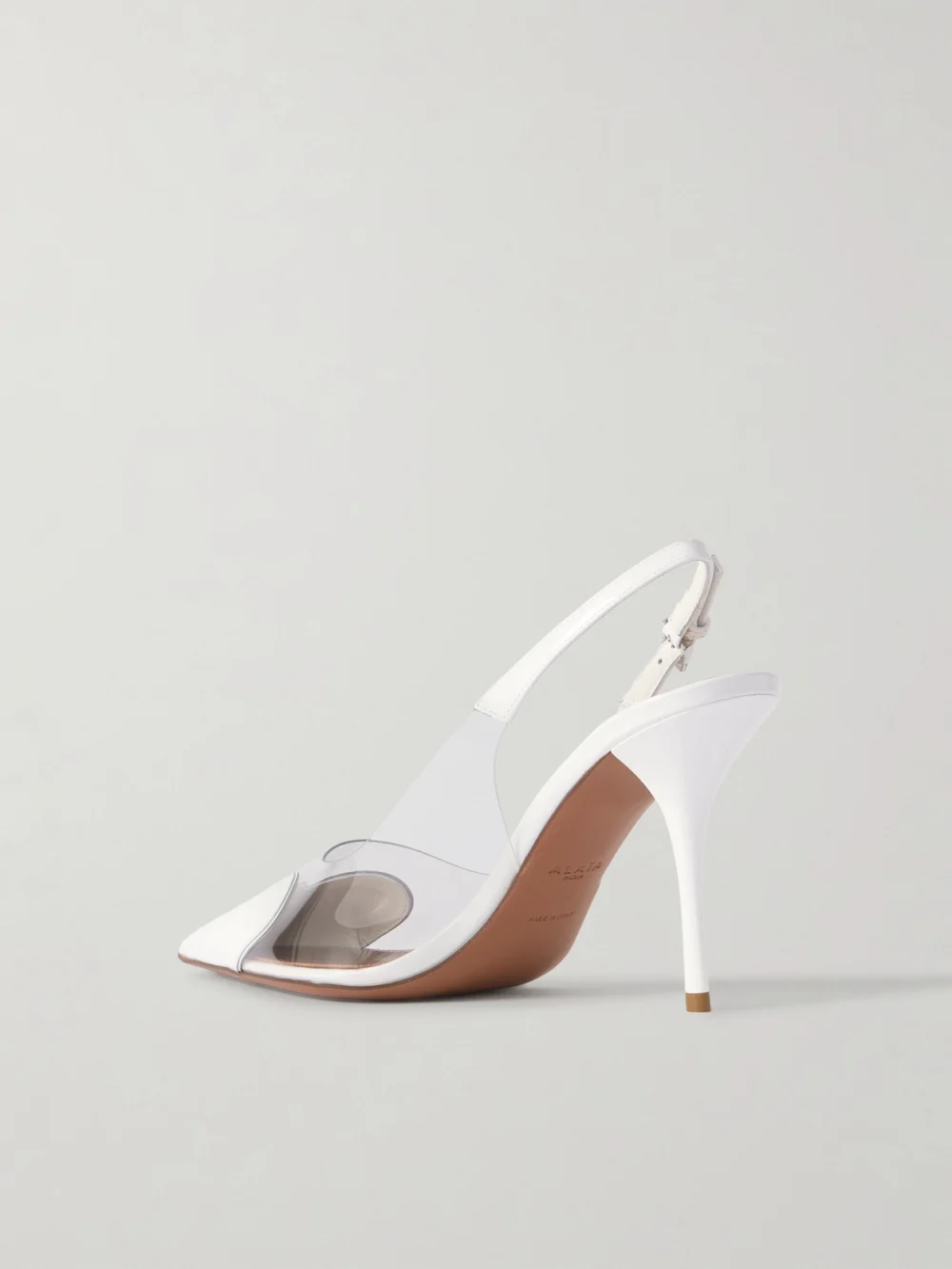 Back view of the Alaïa Le Caur Leather and Pvc Slingback Pumps