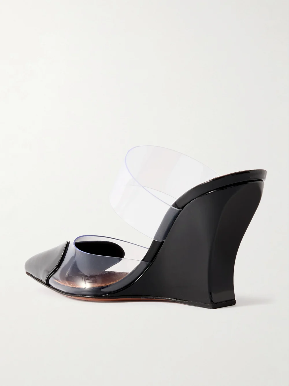 Back view of the Alaïa Le Caur Patent-leather and Pvc Wedge Mules