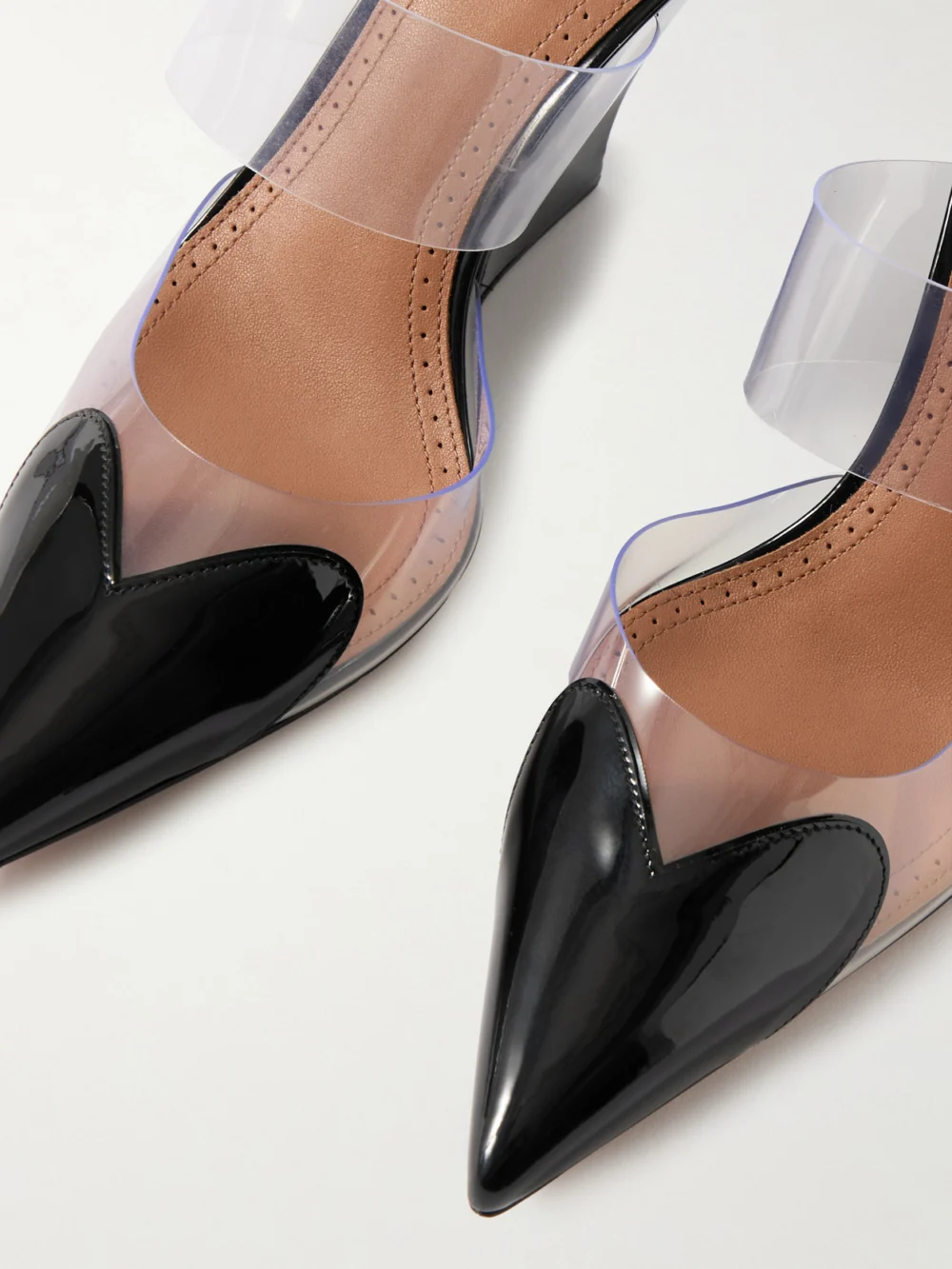 Close-up detail of the Alaïa Le Caur Patent-leather and Pvc Wedge Mules
