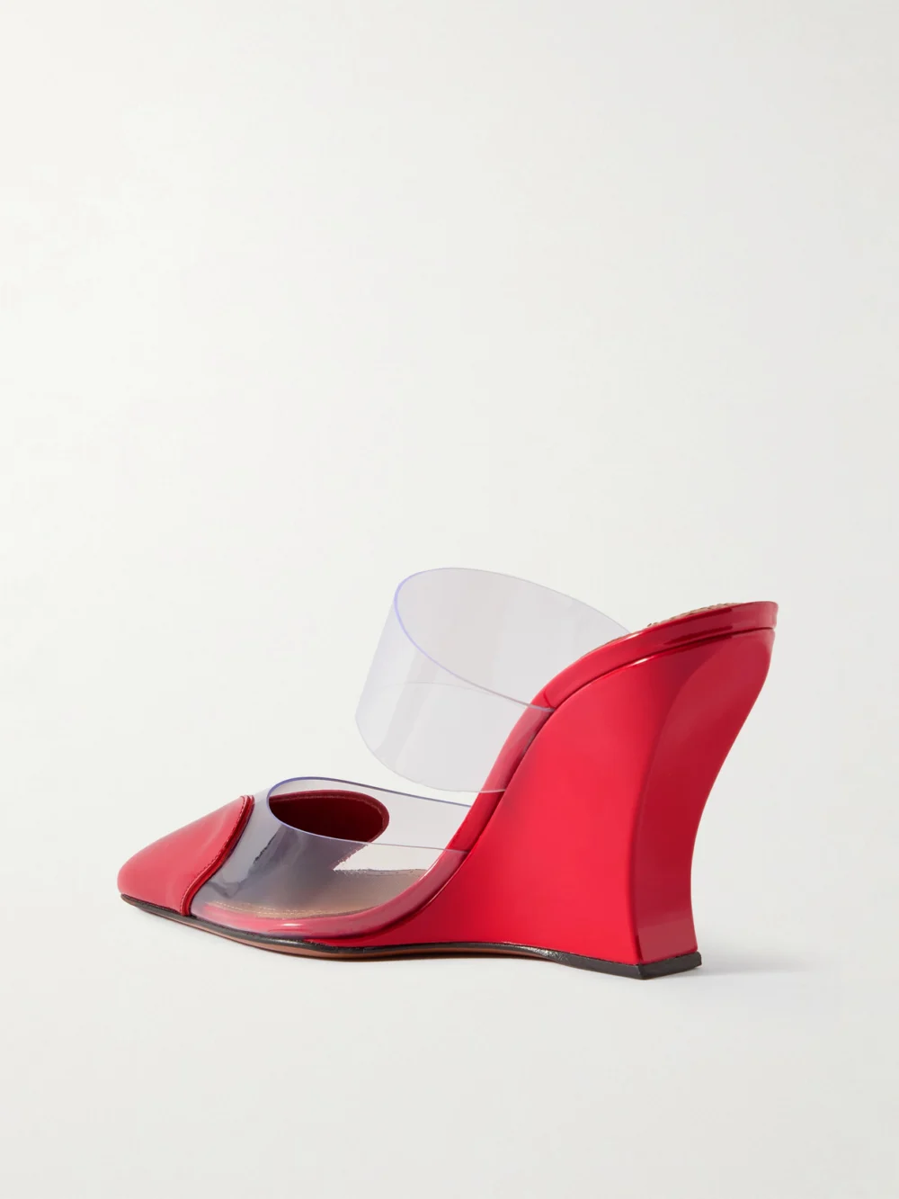 Back view of the Alaïa Le Caur Patent-leather and Pvc Wedge Mules