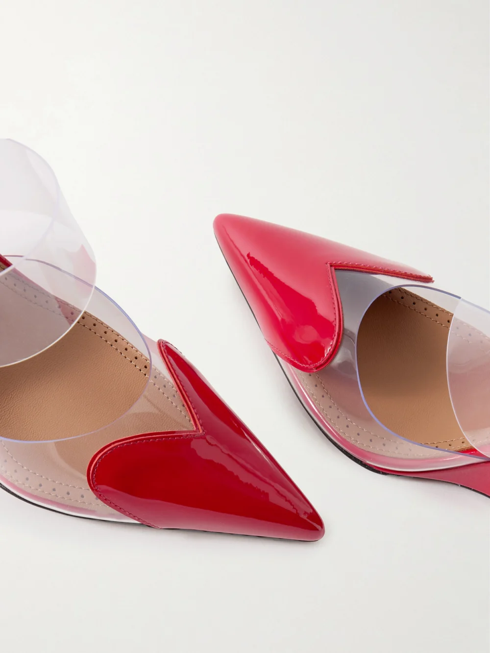 Close-up detail of the Alaïa Le Caur Patent-leather and Pvc Wedge Mules