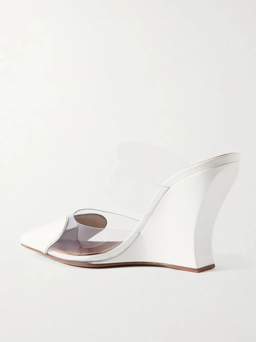 Back view of the Alaïa Le Caur Patent-leather and Pvc Wedge Mules