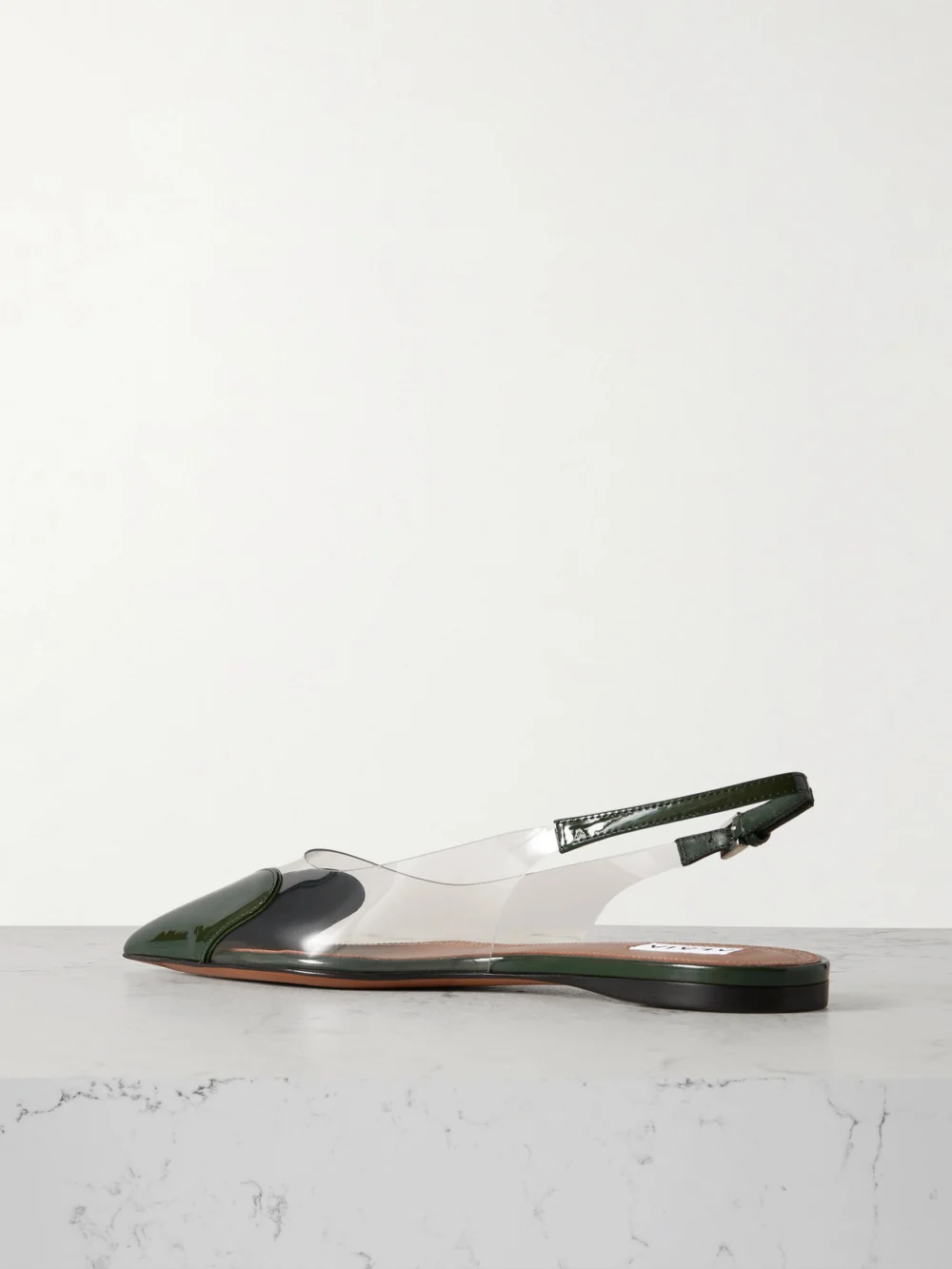 Back view of the Alaïa Le Caur Pu and Patent-leather Slingback Point-toe Flats