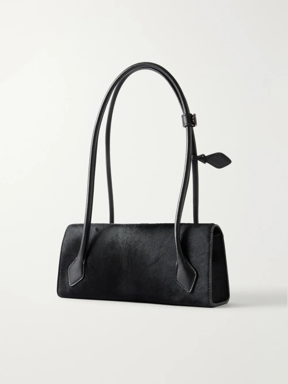 Back view of the Alaïa Le Teckel Flap Small Leather-trimmed Calf Hair Shoulder Bag