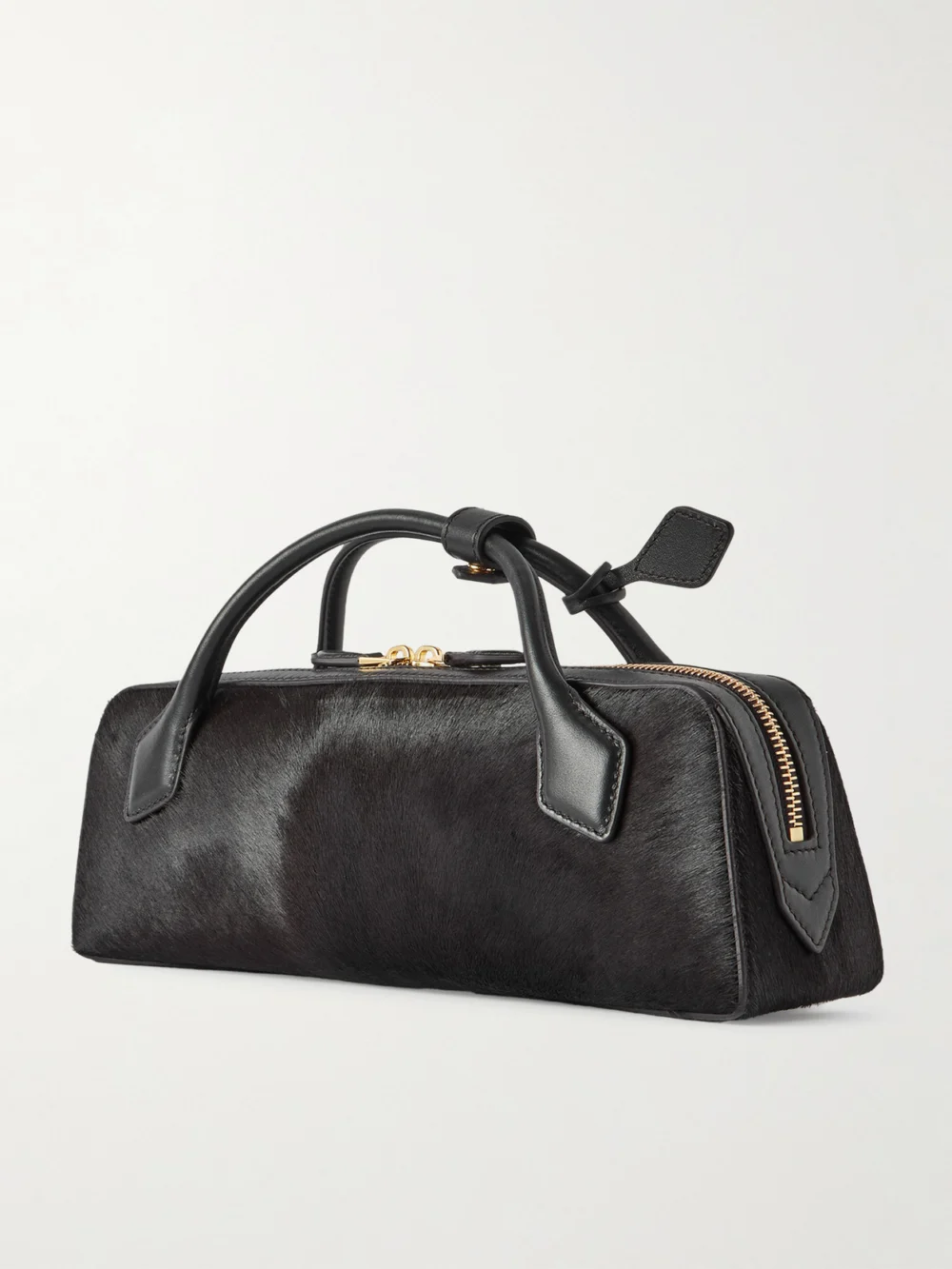 Back view of the Alaïa Le Teckel Leather-trimmed Calf Hair Clutch