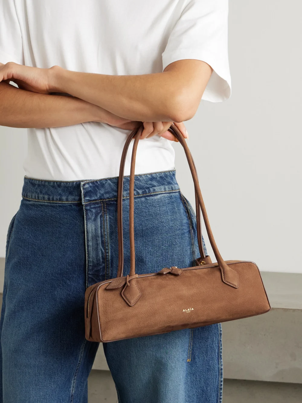 Alaïa Le Teckel Medium Nubuck Shoulder Bag, styled view