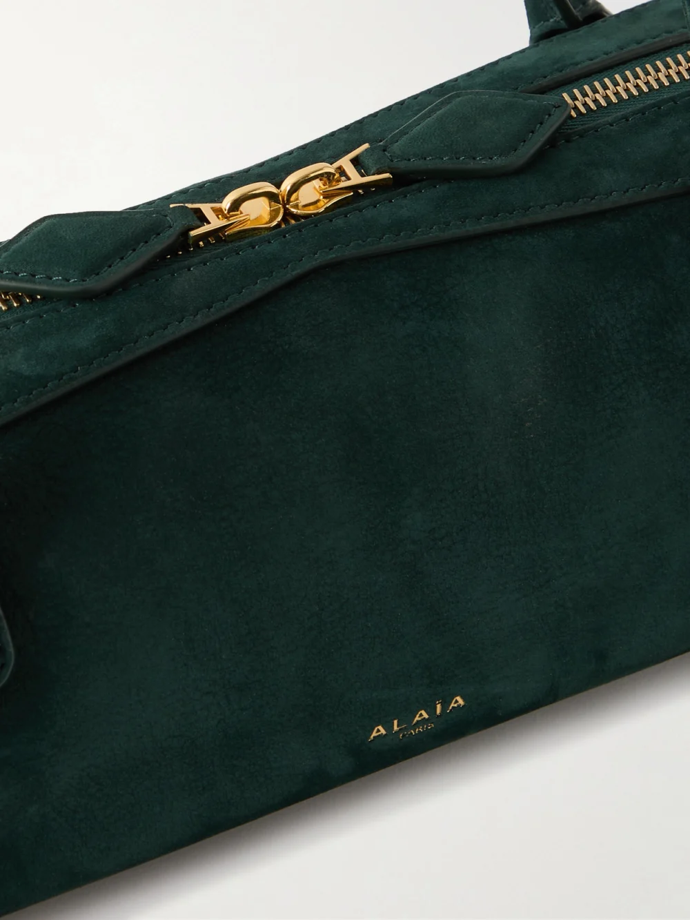 Close-up detail of the Alaïa Le Teckel Medium Nubuck Shoulder Bag