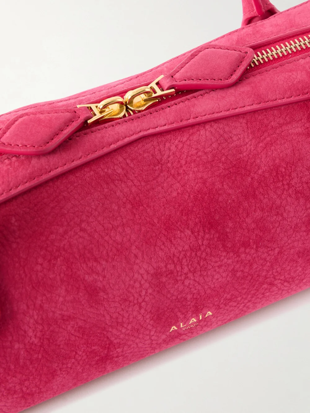 Close-up detail of the Alaïa Le Teckel Medium Nubuck Shoulder Bag