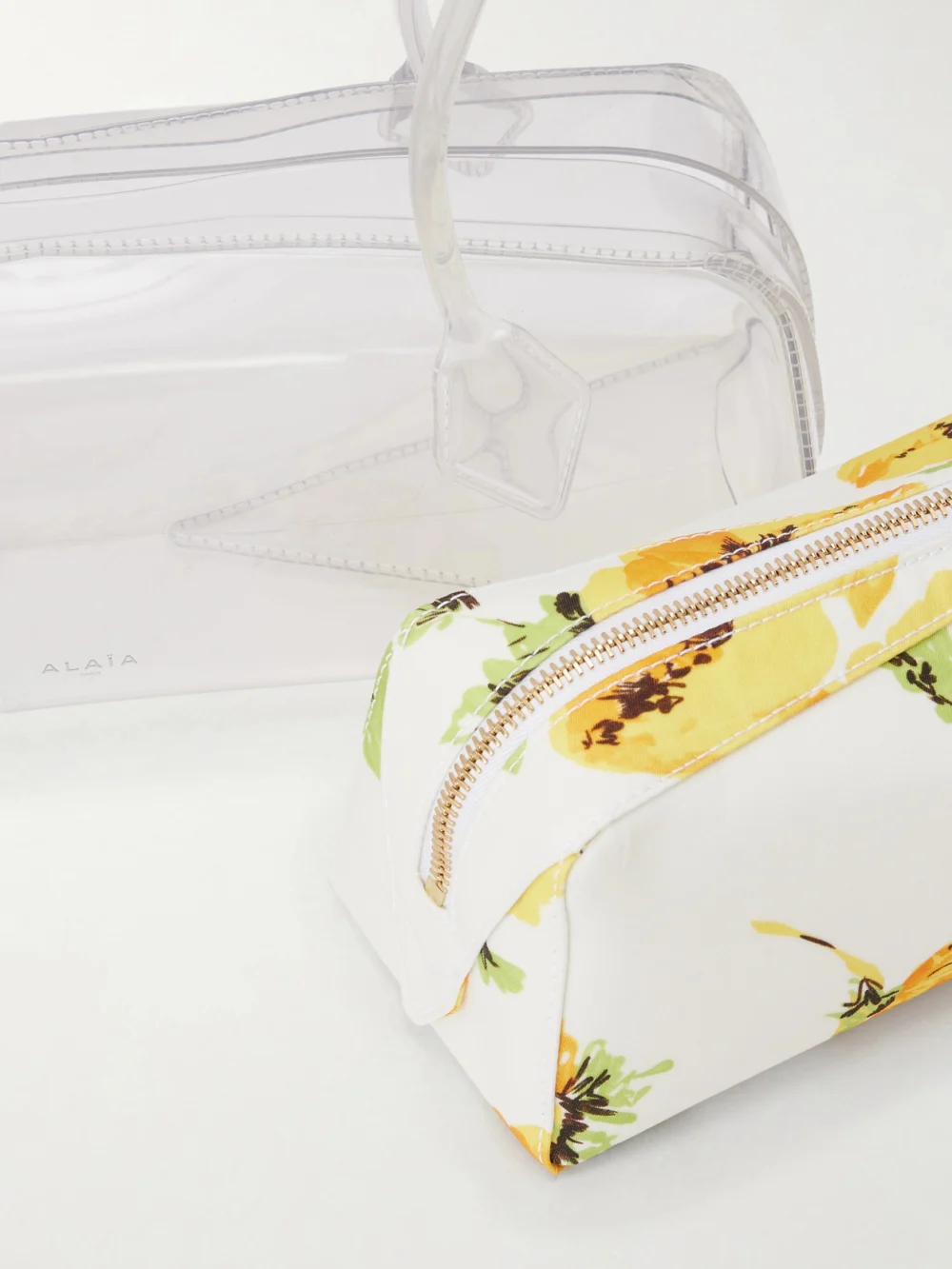 Close-up detail of the Alaïa Le Teckel Pvc Shoulder Bag
