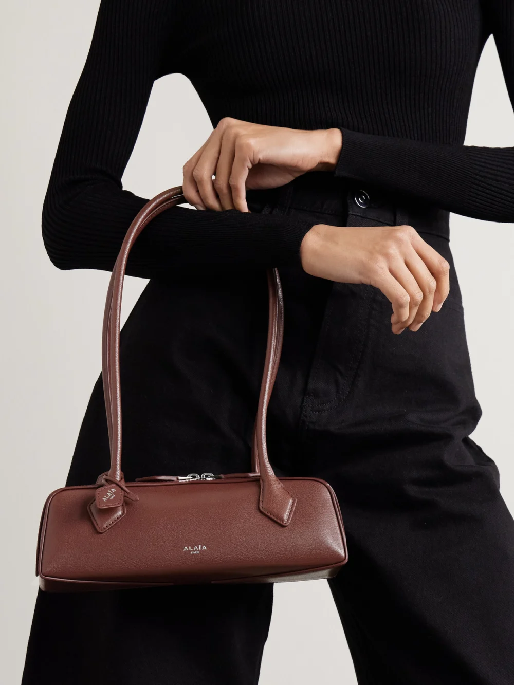 Alaïa Le Teckel Small Leather Shoulder Bag, styled view