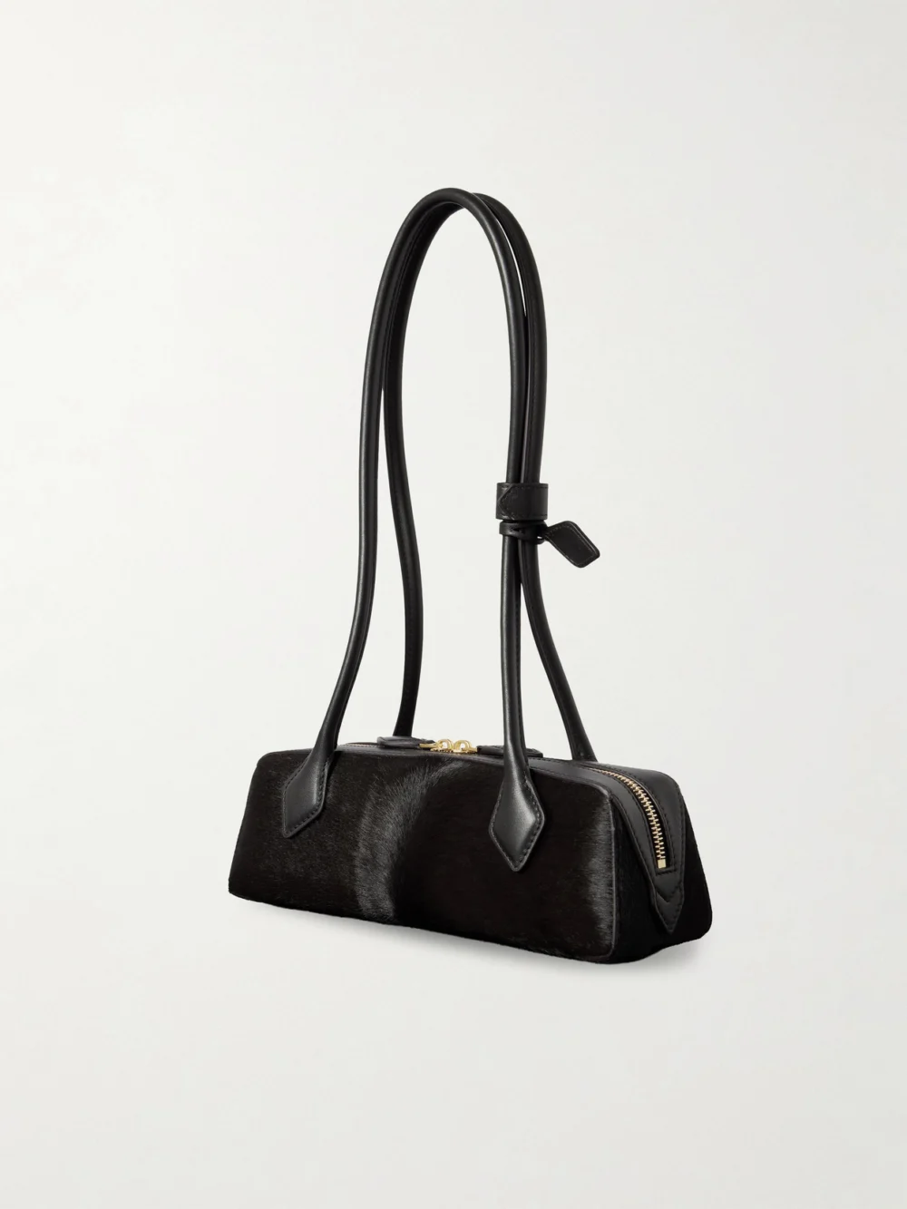 Back view of the Alaïa Le Teckel Small Leather-trimmed Calf Hair Shoulder Bag