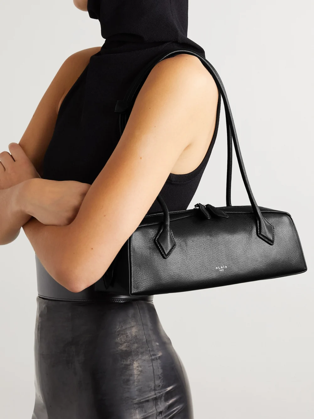 Alaïa Le Teckel Textured-leather Shoulder Bag, styled view