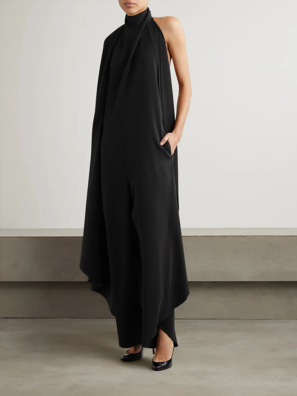 Alaïa Open-back Asymmetric Grain De Poudre Wool-blend Jumpsuit, worn by a model