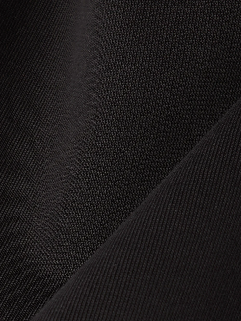 Close-up detail of the Alaïa Oversized Cotton-jersey Sweatshirt