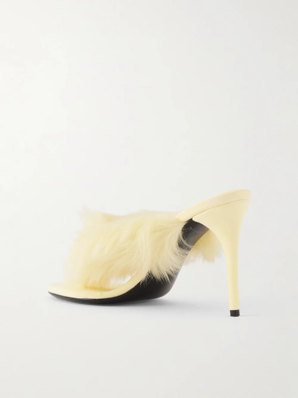 Back view of the Alaïa Shearling Mules
