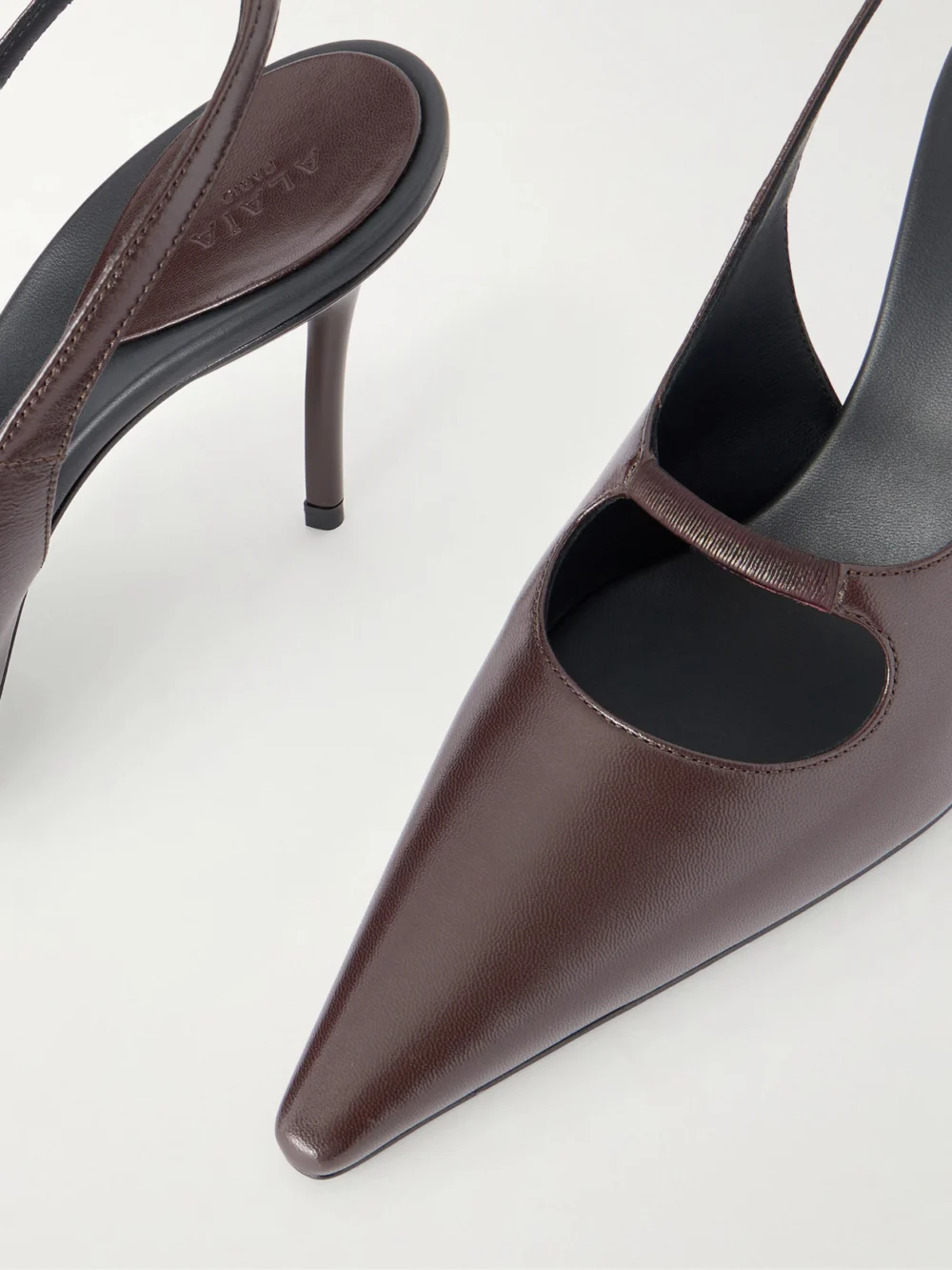 Close-up detail of the Alaïa Stefanil 90 Leather Slingback Pumps