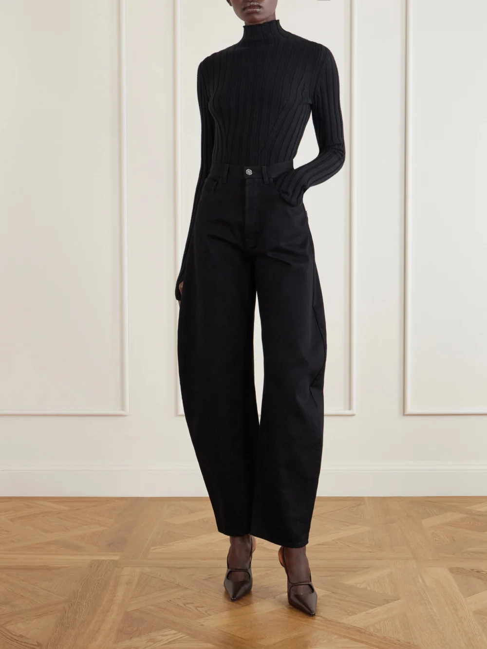 Alaïa Stefanil 90 Leather Slingback Pumps, styled view