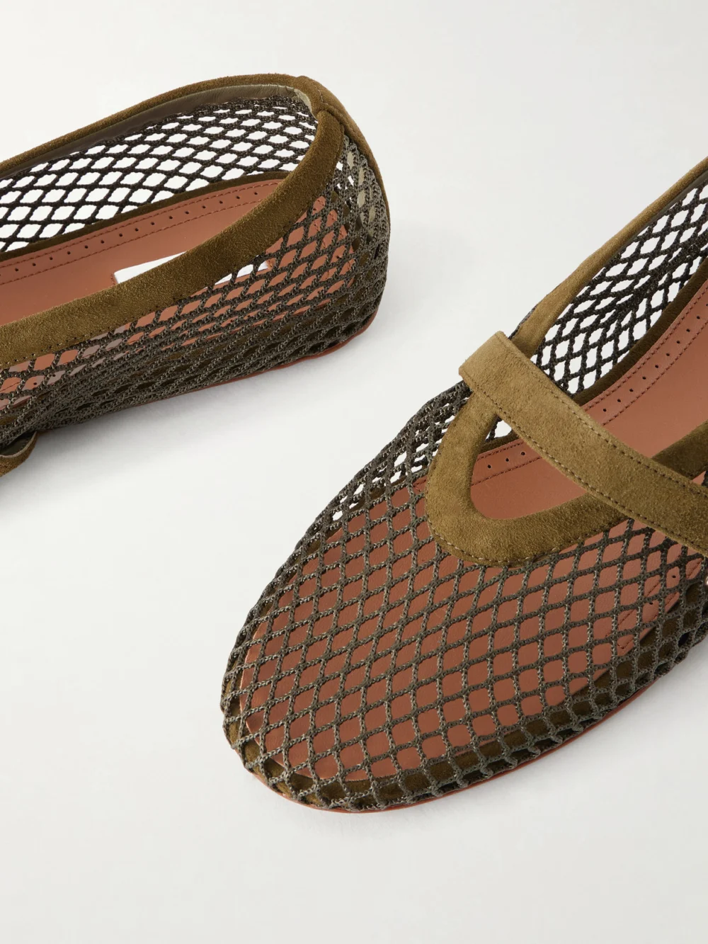 Close-up detail of the Alaïa Suede-trimmed Mesh Ballet Flats