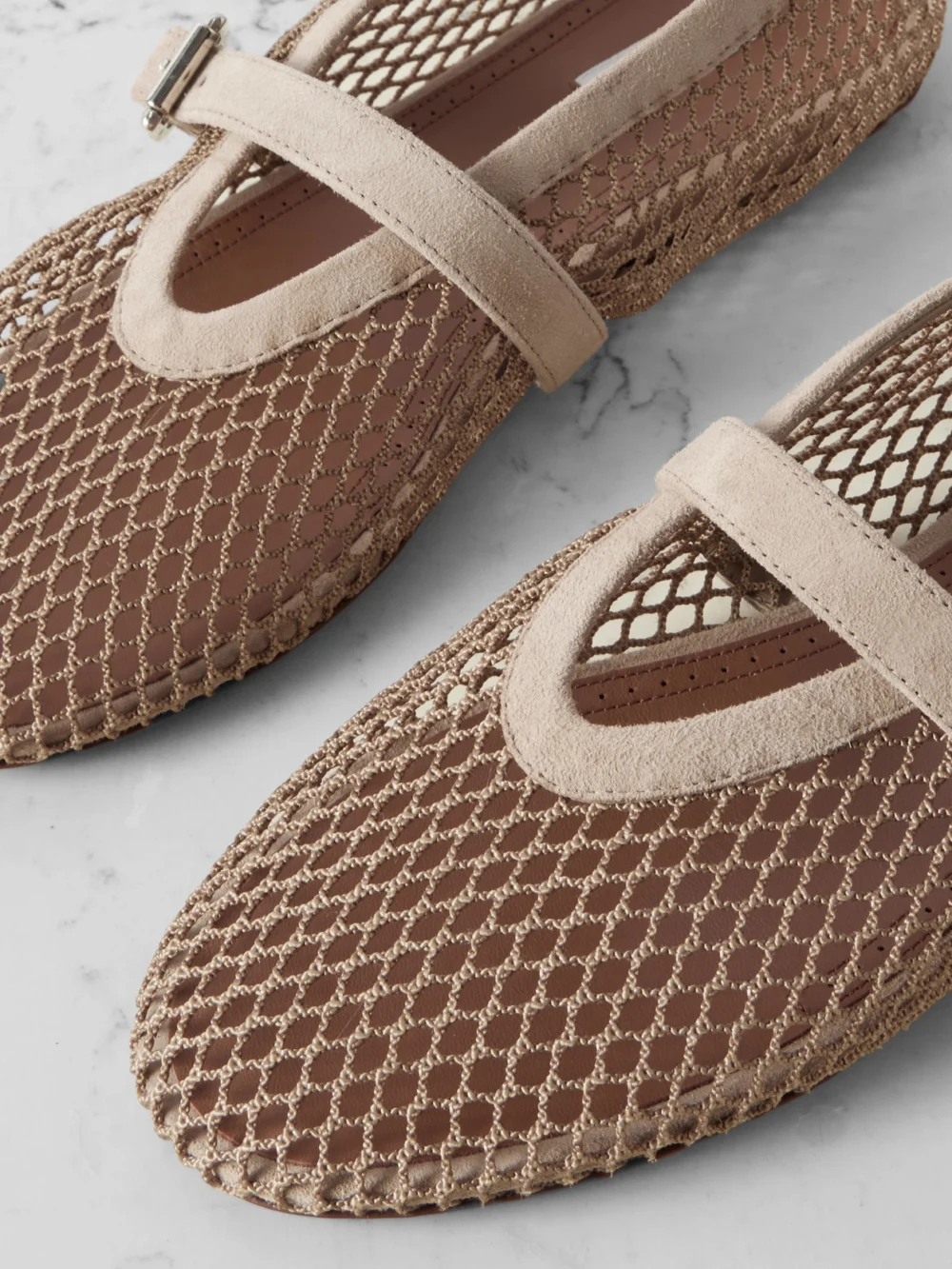 Close-up detail of the Alaïa Suede-trimmed Mesh Ballet Flats