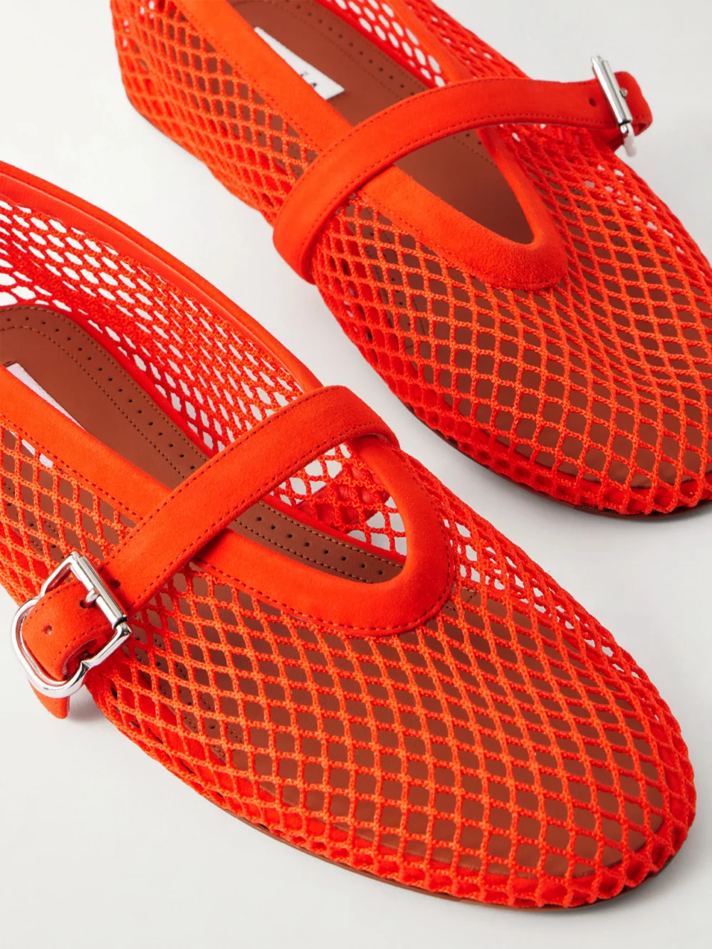 Close-up detail of the Alaïa Suede-trimmed Mesh Ballet Flats