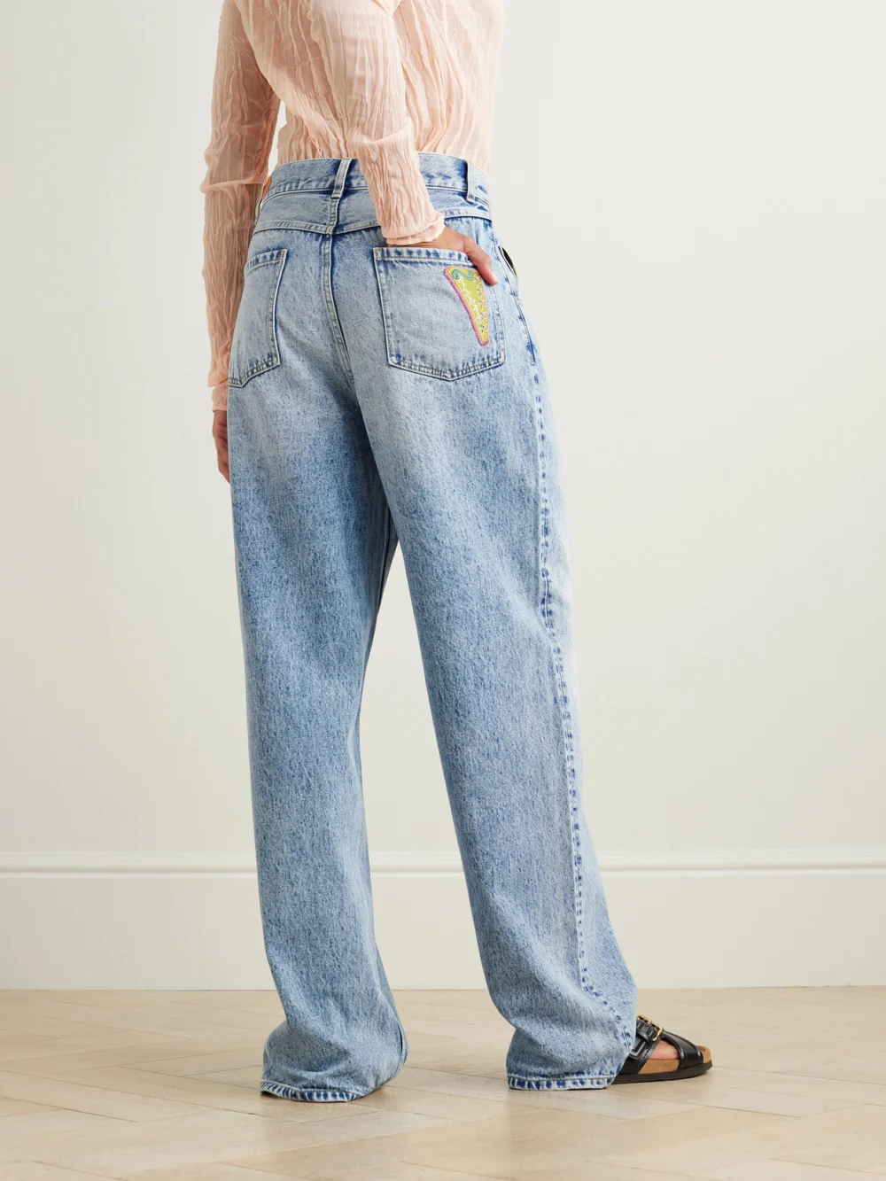 Back view of the Alémais Jackpot Appliquéd High-rise Straight-leg Jeans
