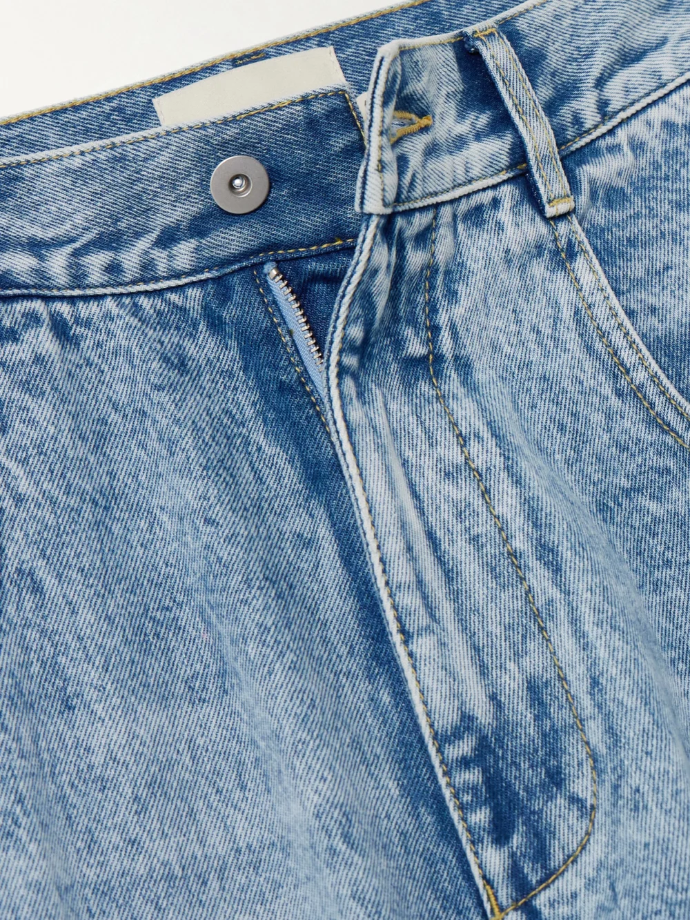 Close-up detail of the Alémais Jackpot Appliquéd High-rise Straight-leg Jeans