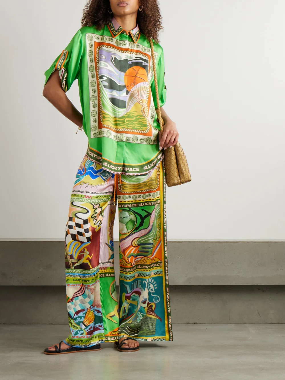 Alémais Lucky Pace Printed Silk-satin Shirt, worn by a model