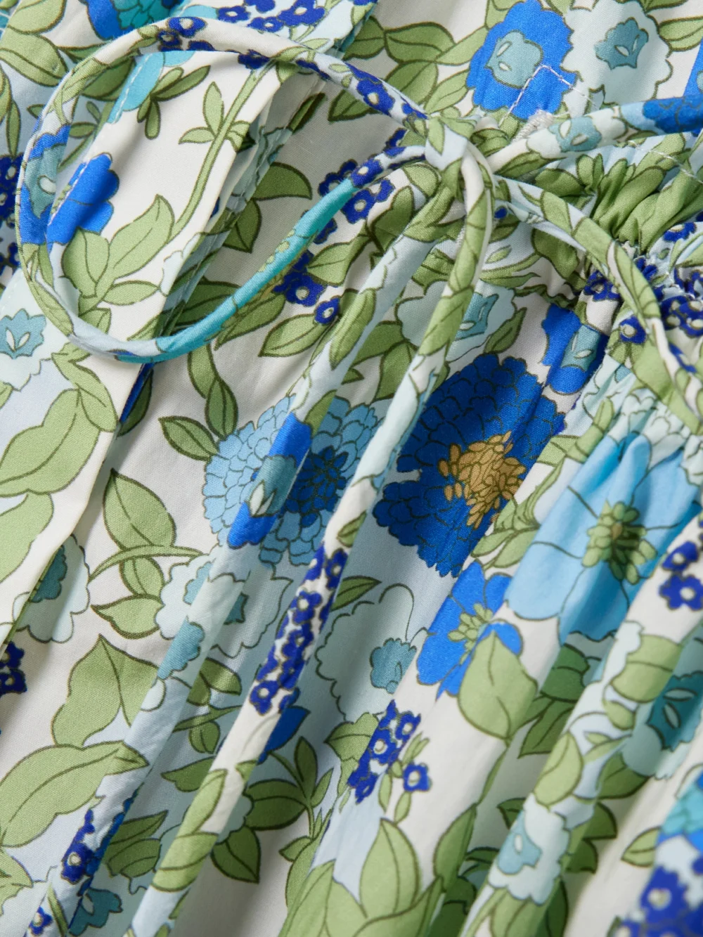 Close-up detail of the Alémais Pam Floral-print Organic Cotton-poplin Mini Dress