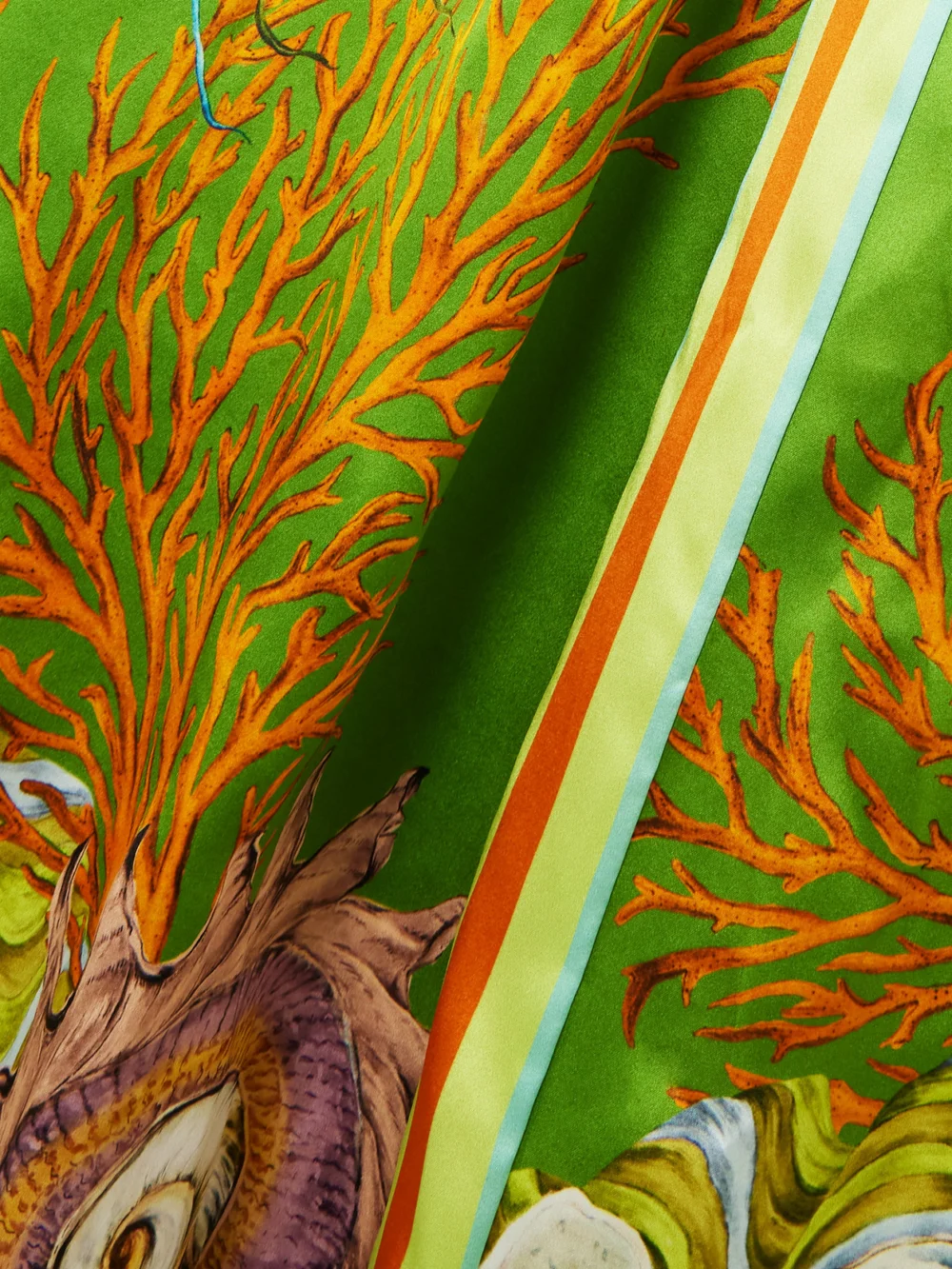 Close-up detail of the Alémais + Sam Pauletto Aquatica Printed Silk-satin Wide-leg Pants
