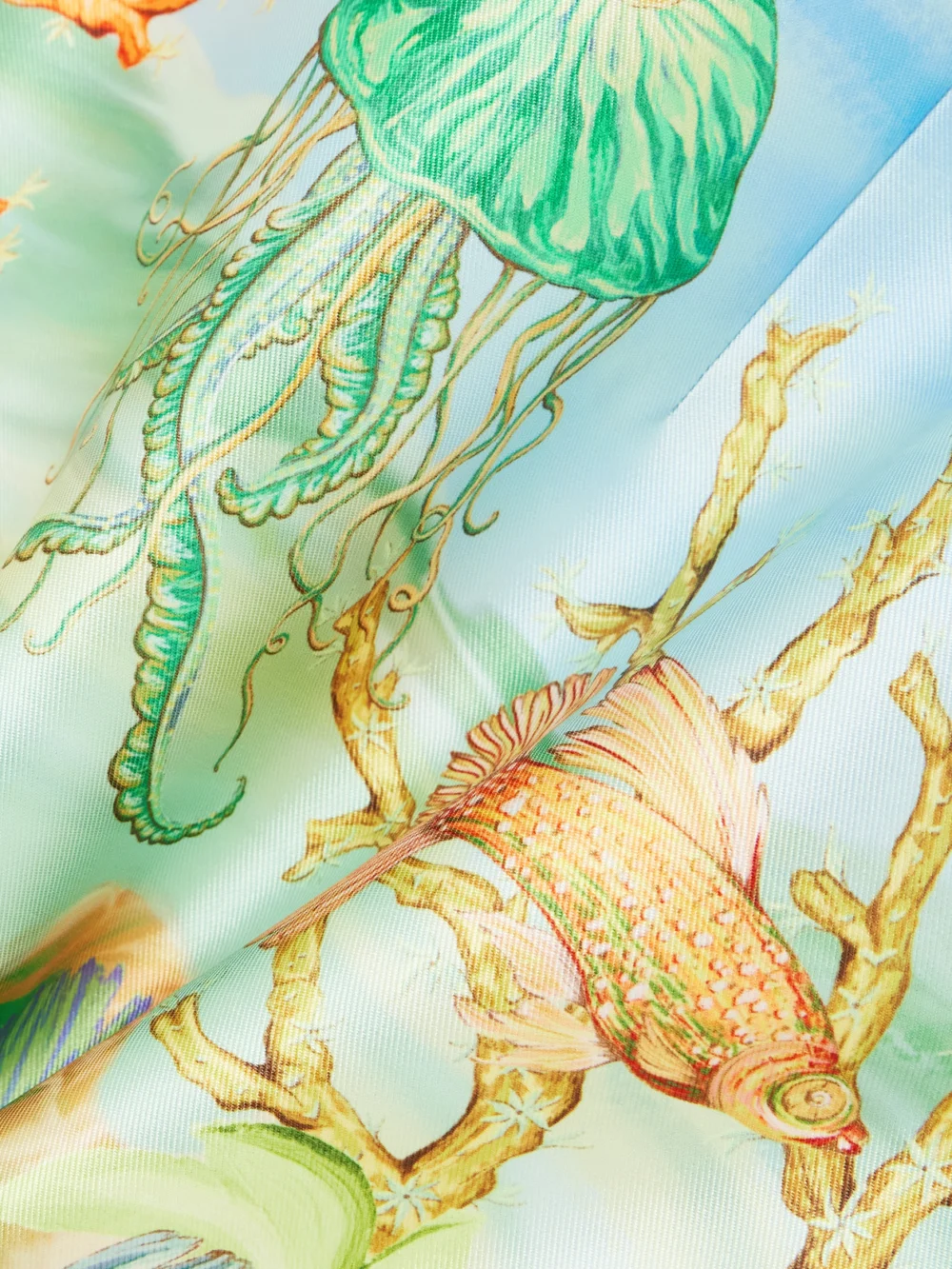Close-up detail of the Alémais + Sam Pauletto Emerald Cove Off-the-shoulder Gathered Printed Recycled Duchesse-satin Mini Dre