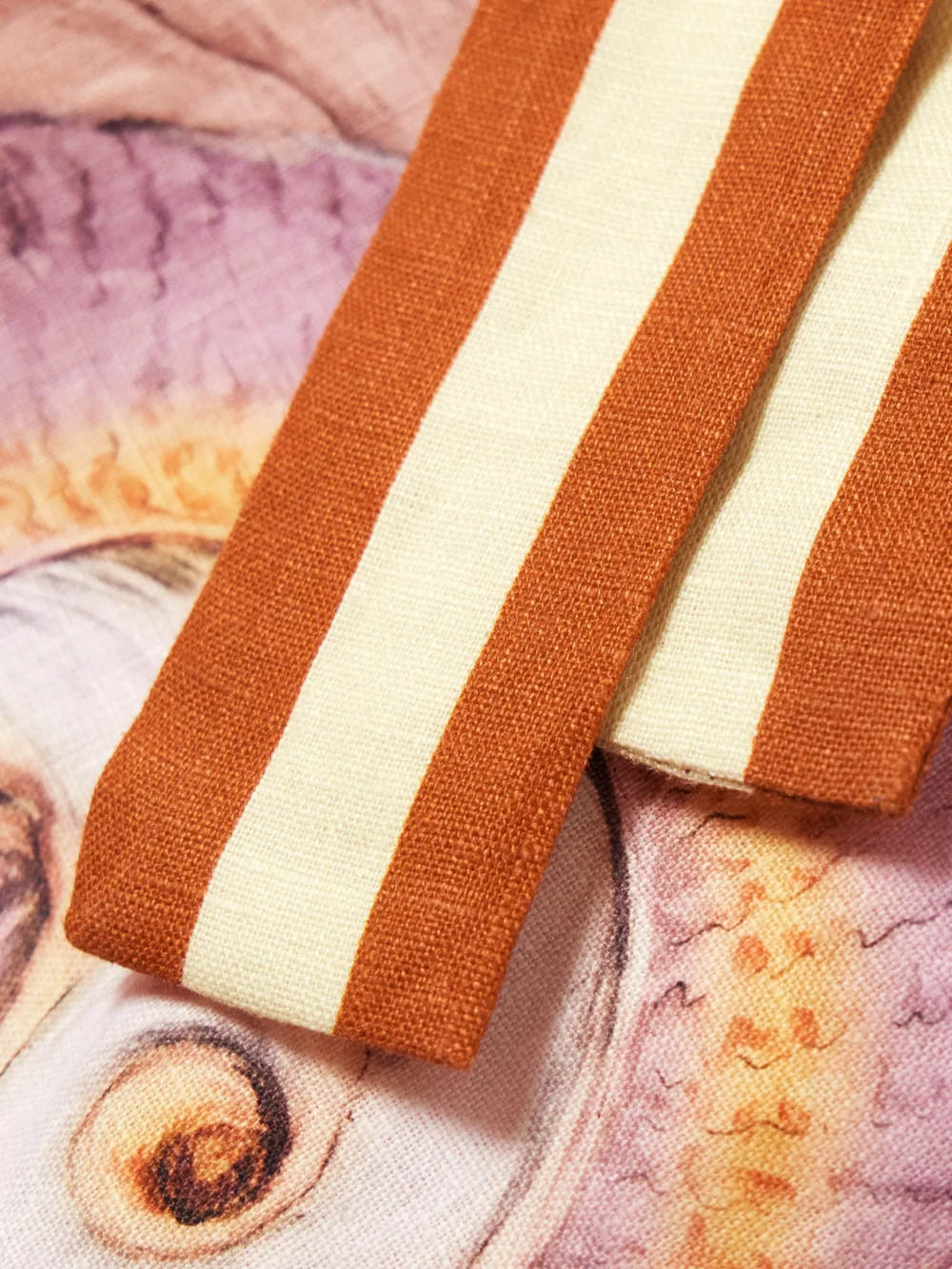 Close-up detail of the Alémais + Sam Pauletto Nereids Belted Printed Linen-gauze Mini Shirt Dress
