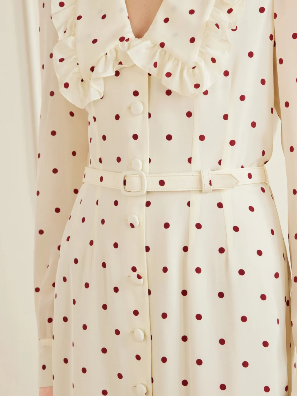 Close-up detail of the Alessandra Rich Belted Polka-dot Silk-crepe Midi Dress