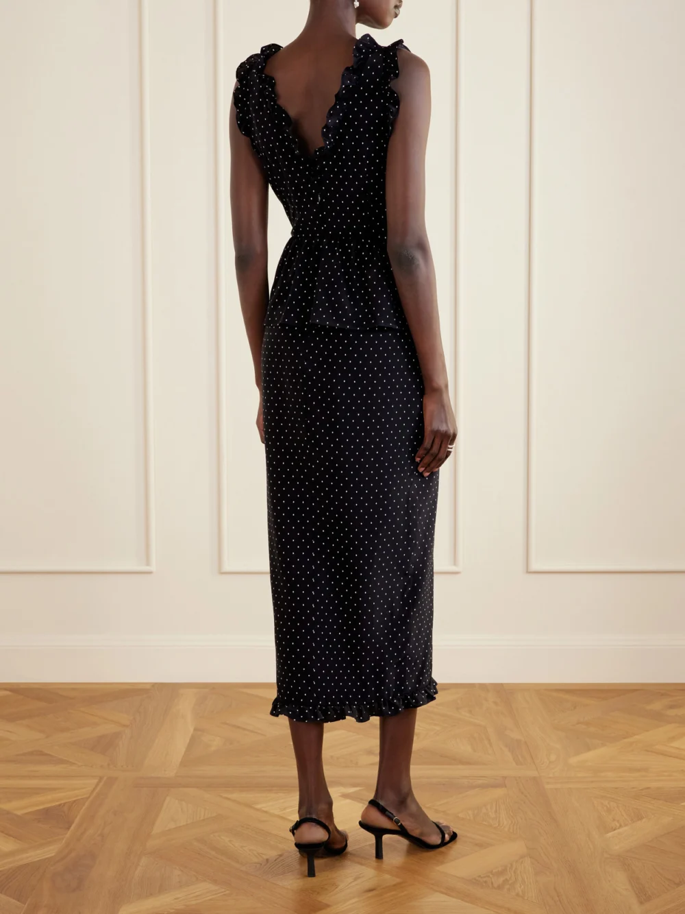 Back view of the Alessandra Rich Bow-embellished Polka-dot Silk Midi Dress
