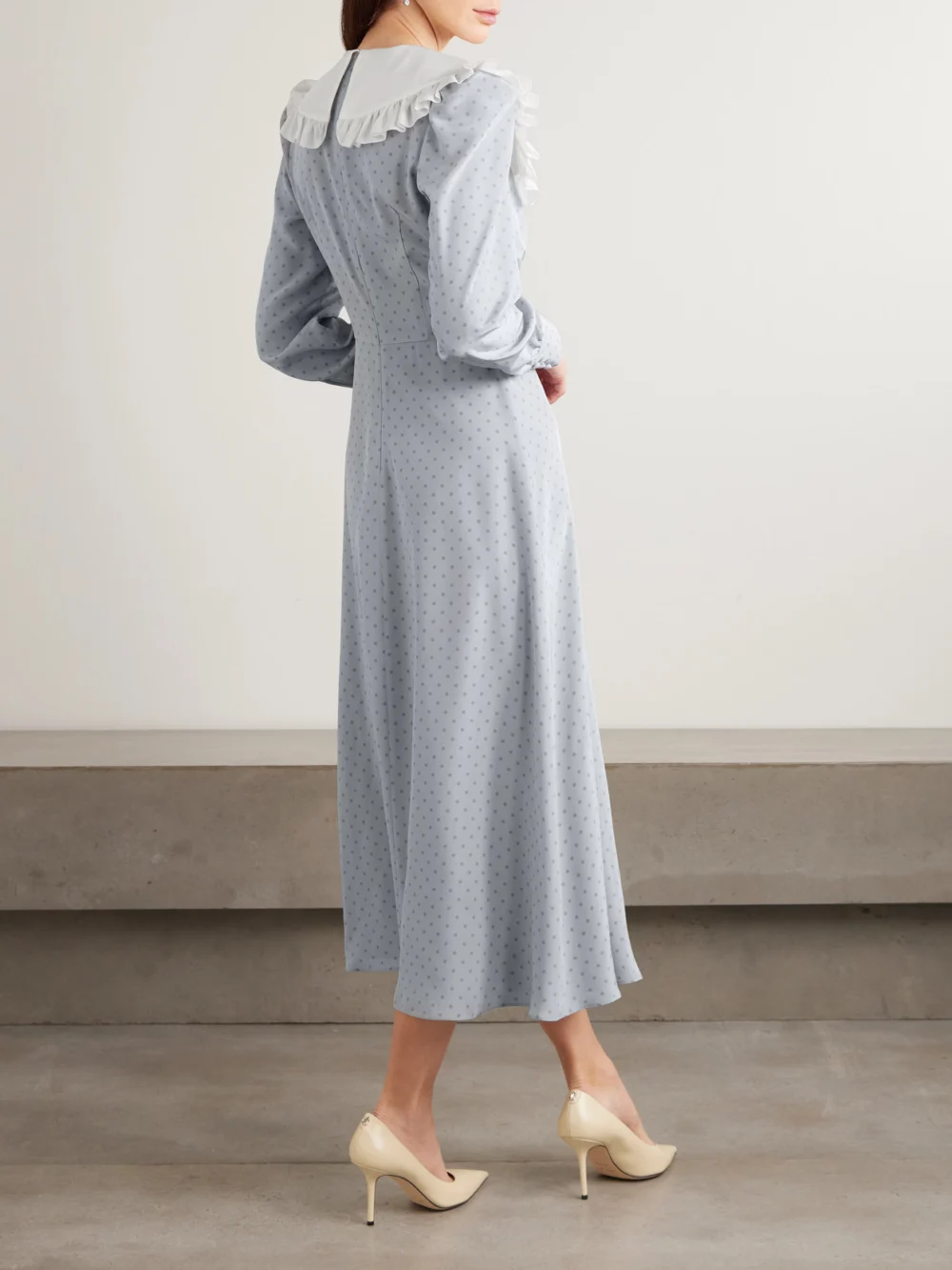 Back view of the Alessandra Rich Bow-embellished Ruffled Polka-dot Silk Crepe De Chine Midi Dress