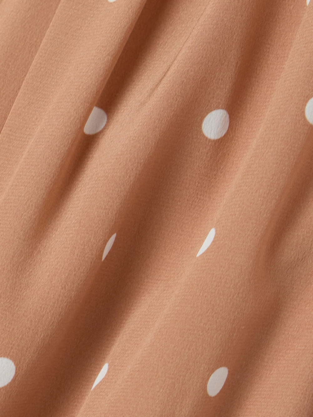 Close-up detail of the Alessandra Rich Gathered Polka-dot Silk Crepe De Chine Midi Dress