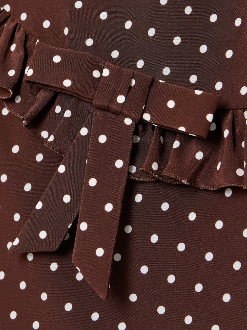Close-up detail of the Alessandra Rich Ruffled Bow-detailed Polka-dot Silk Crepe De Chine Midi Dress