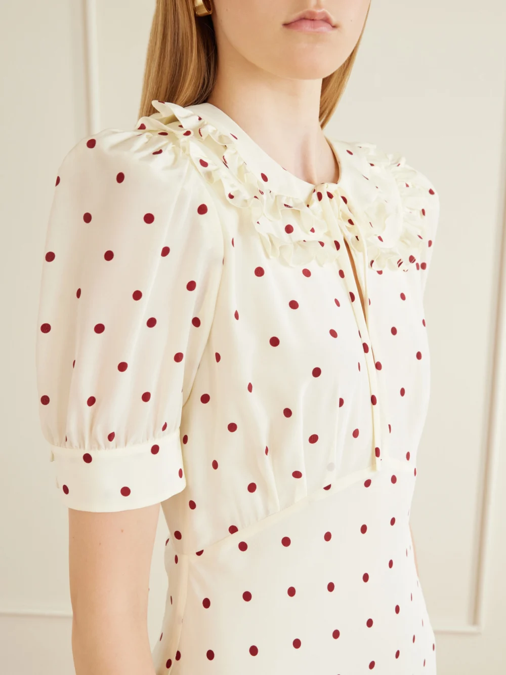 Close-up detail of the Alessandra Rich Ruffled Polka-dot Silk Midi Dress