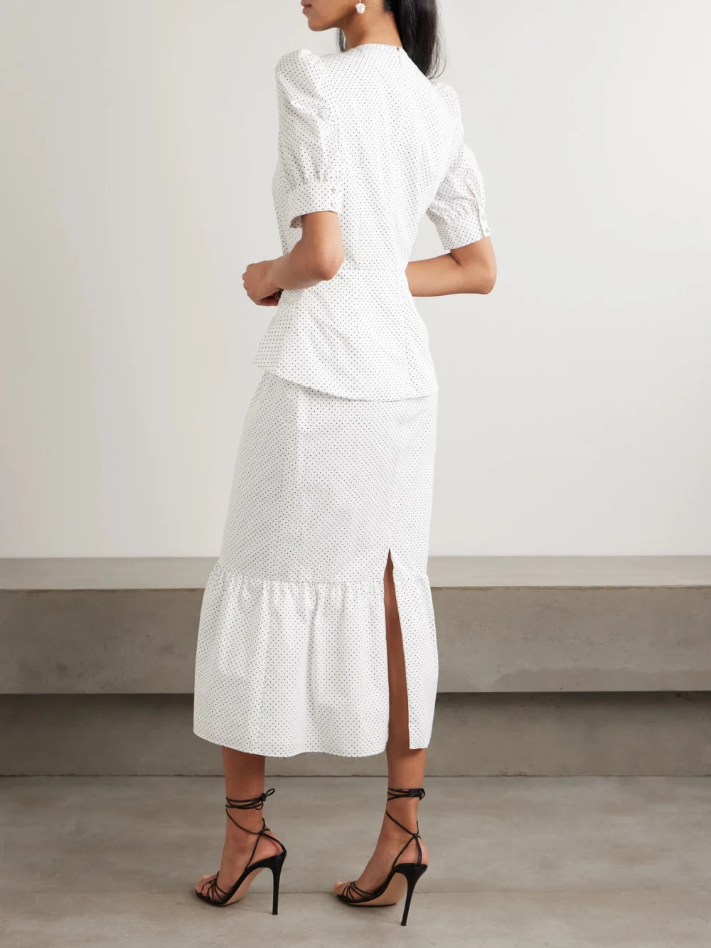 Back view of the Alessandra Rich Twist-front Gathered Printed Cotton-poplin Midi Dress