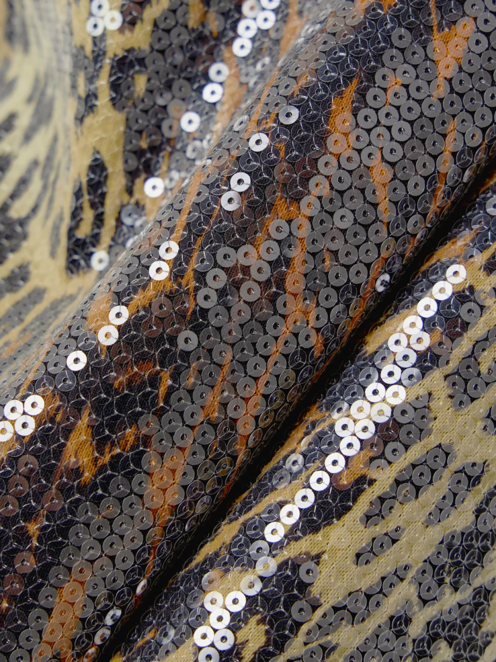 Close-up detail of the Alex Perry Leopard-print Sequined Stretch-mesh Midi Dress