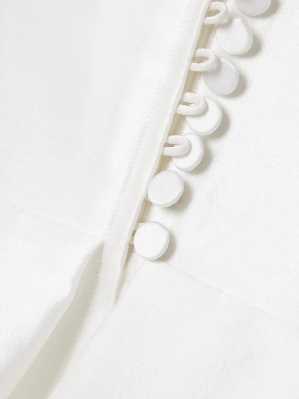 Close-up detail of the Alex Perry Strapless Draped Sateen Mini Dress