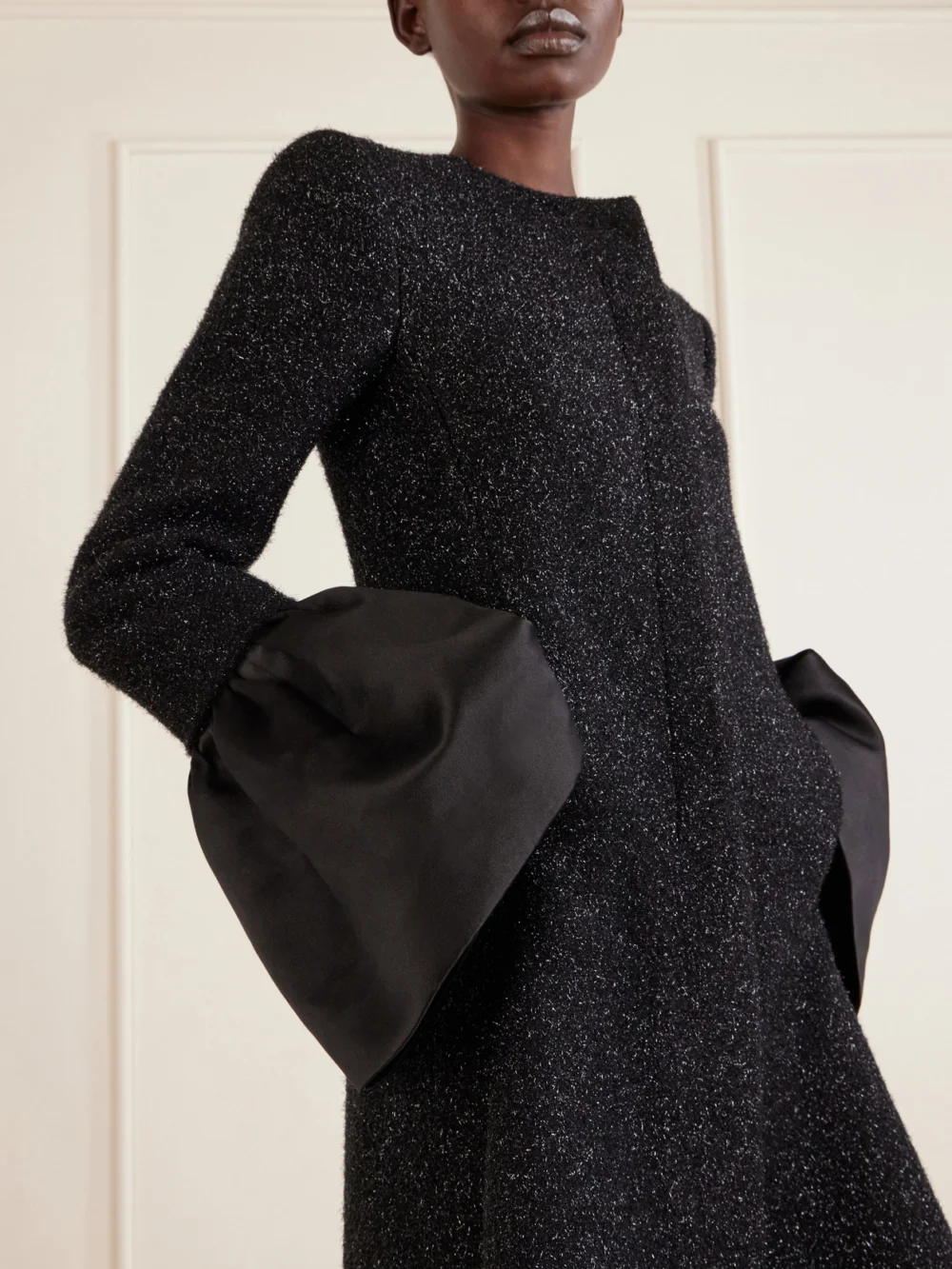 Close-up detail of the Alexander McQueen Asymmetric Satin-trimmed Metallic Long Coat