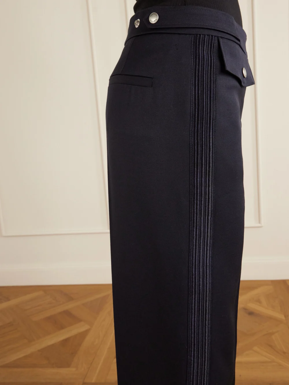 Close-up detail of the Alexander McQueen Bumster Wool Straight-leg Pants