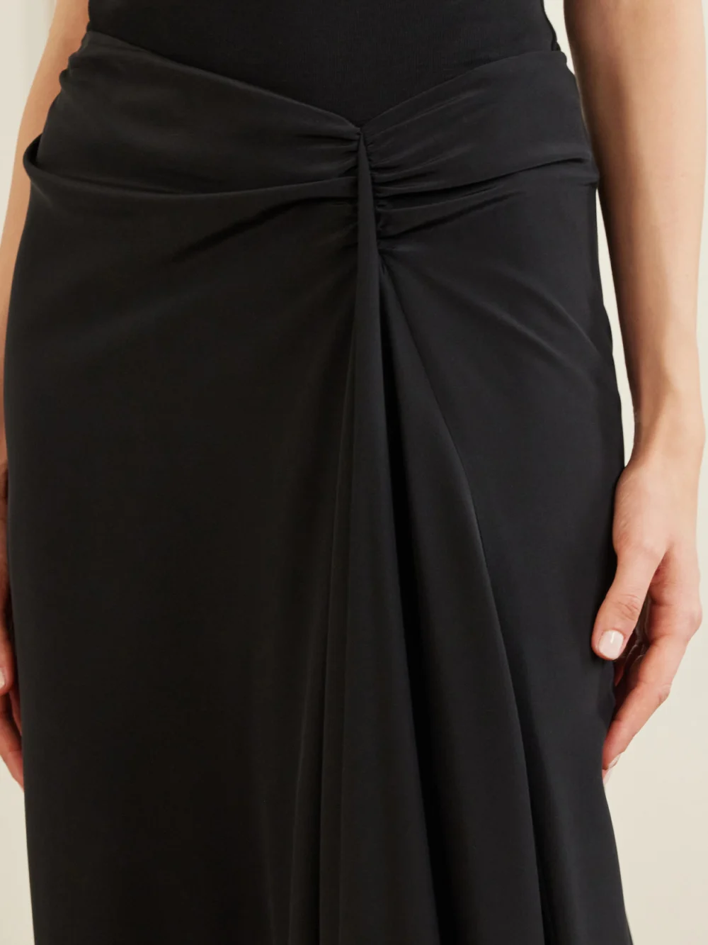 Close-up detail of the Alexander McQueen Draped Silk Maxi Skirt