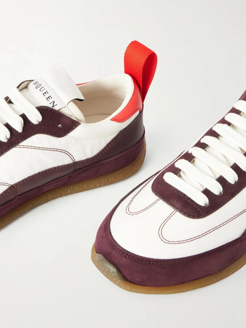 Close-up detail of the Alexander McQueen Ec1 Suede and Leather-trimmed Shell Sneakers