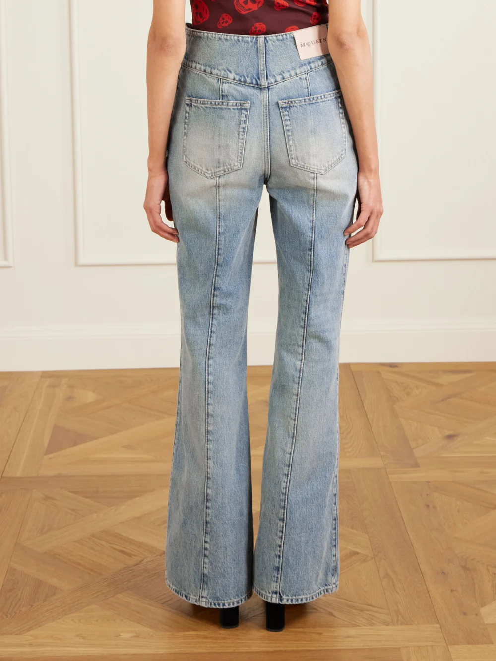 Back view of the Alexander McQueen High-rise Flared Jeans