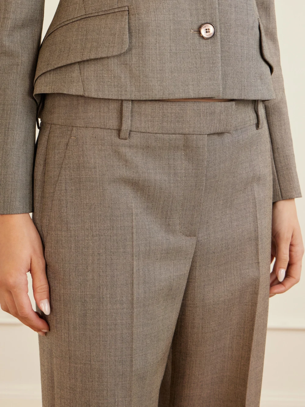 Close-up detail of the Alexander McQueen Pleated Wool-gabardine Straight-leg Pants