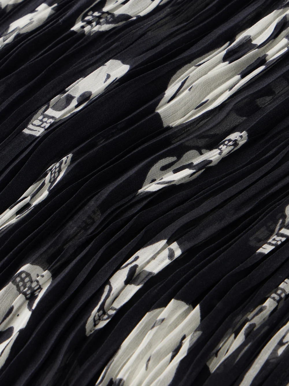 Close-up detail of the Alexander McQueen Printed Silk-plissé Scarf