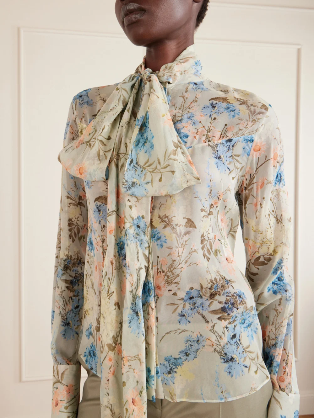 Close-up detail of the Alexander McQueen Pussy-bow Floral-print Silk-chiffon Blouse